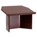 A mahogany foldable tabletop lectern on a wooden table.