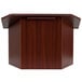 A mahogany tabletop lectern with a wood grained surface.