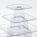 A stack of clear plastic trays on a Matfer Bourgeat 9-tier display stand.