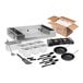 A Choice 57-piece deluxe butane omelet and pasta station kit on a black gas stove with two burners.