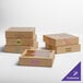 A group of Kraft bakery boxes with clear windows on a table.