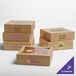 A group of Kraft bakery boxes with customizable windows and logos.