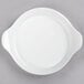 A white Libbey porcelain dish with handles.