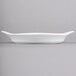 A white rectangular Libbey porcelain dish with a handle.