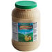 A Hidden Valley jar of yellow honey mustard dressing with a green lid.