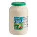 A 1-gallon container of Hidden Valley Ranch dressing with a green lid.