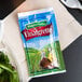 A Hidden Valley Balsamic Vinaigrette packet on a napkin.