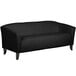 A Flash Furniture black leather sofa with wooden legs.