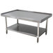 An Advance Tabco stainless steel equipment stand with a shelf.