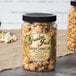 A jar of Grandma Jack's Gourmet Caramel Corn.