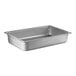 A Vollrath stainless steel steam table pan with a lid on a counter.