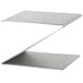 A metal Z-shaped riser on a table.