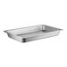 A Vollrath stainless steel hotel pan on a counter.