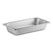 A close-up of a Vollrath stainless steel steam table pan with a lid.