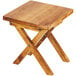 A Cal-Mil Madera rustic pine folding riser on a wooden table.