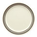 A white GET Diamond Cambridge melamine plate with a black rim.