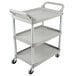 A gray Rubbermaid three shelf utility cart with wheels.