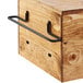 A black wooden shelf bracket.
