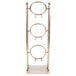 A Cal-Mil metal stand with three vertical circles.