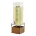 A Cal-Mil beverage dispenser with a wooden and chrome stand.