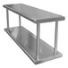 A stainless steel wall mount shelf with two metal shelves on it.