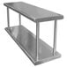 A stainless steel Advance Tabco pass-through shelf with two metal shelves on it.