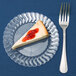 A slice of cheesecake on a clear Fineline Flairware plastic plate with a fork.