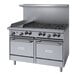 A stainless steel Garland commercial gas range with 6 burners and a griddle over 2 storage bases.