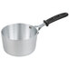 A Vollrath Wear-Ever aluminum sauce pan with a black silicone handle.