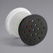 a black circular object with many holes