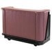 A pink and black Cambro portable bar.