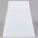 A white plastic cube bowl.