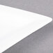 A CAC white porcelain plate with a white rim.