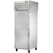 A stainless steel True pass-through heated holding cabinet with a solid door and a silver handle.