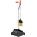 An Unger angled lobby broom and dustpan with a telescopic handle.