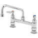 A chrome T&S deck-mounted pantry faucet with two handles.