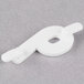A white plastic Ketchum Manufacturing deli tag insert with a hole in the middle.
