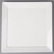 A white square porcelain plate with a white rim.