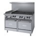 A stainless steel Garland commercial gas range with a griddle and two ovens.