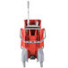 A red Unger mop bucket with wringer and wheels.