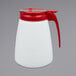 A white plastic container with a red lid and spout.