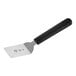 A black and white Mercer Culinary Mini Turner with a black handle.