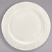 A white Homer Laughlin Ivory China plate with a circular patterned edge.