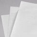 A stack of Choice white newsprint sandwich wrap paper.