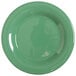 A close-up of a green GET Diamond Mardi Gras melamine plate with a white edge.