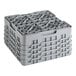 A grey plastic Cambro glass rack with 25 compartments and 4 extenders.