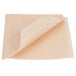 A close-up of a Bagcraft Packaging EcoCraft Kraft paper with a curled corner.