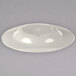 A Carlisle bone melamine chef bowl on a white background.