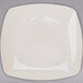 A white square plastic plate with a white rim.