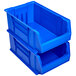 a blue plastic bin with a couple of compartments